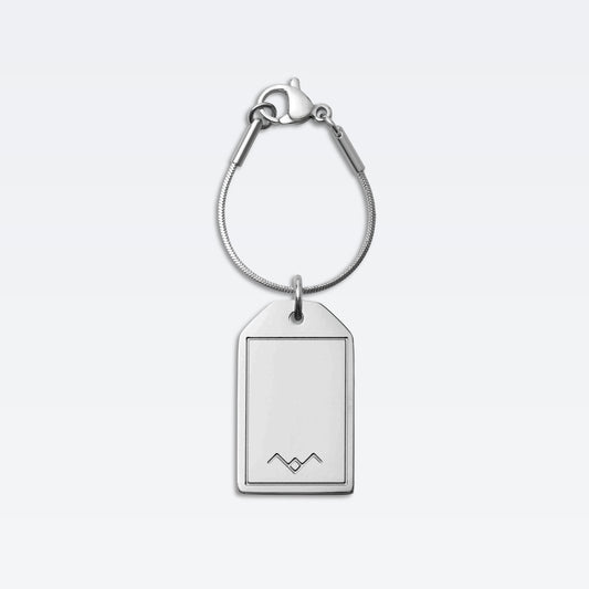 The Flight Series Luggage Label Charm in Palladium